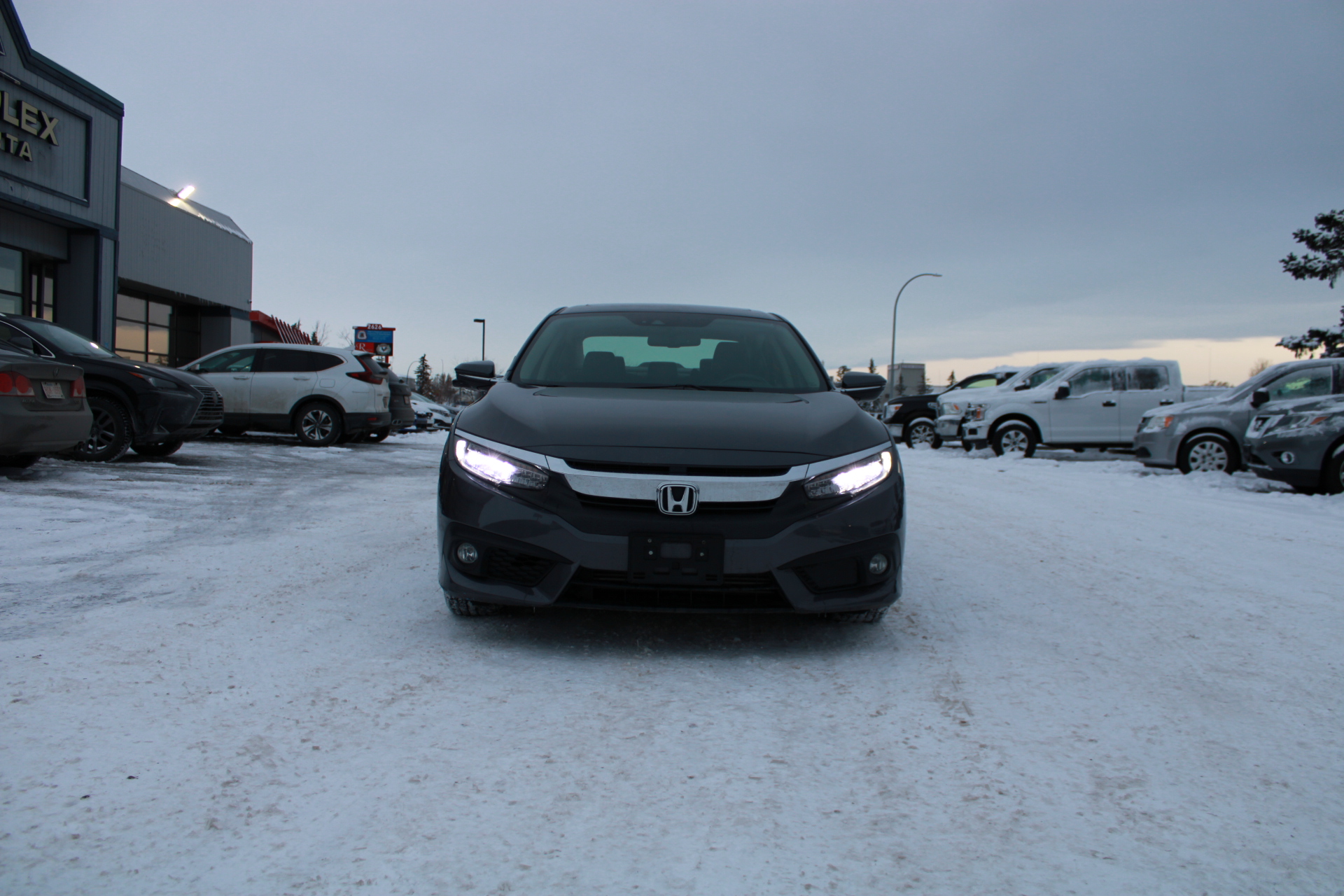 Preowned 2018 Honda Civic Touring Sedan in Calgary Alberta